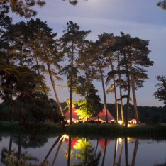 Tipi at night at Brook Farm Cuffley